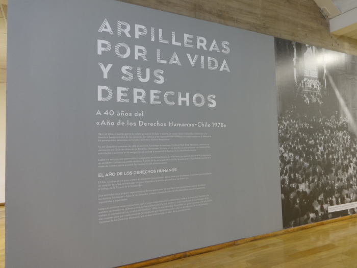 large text panel on arpillera exhibit